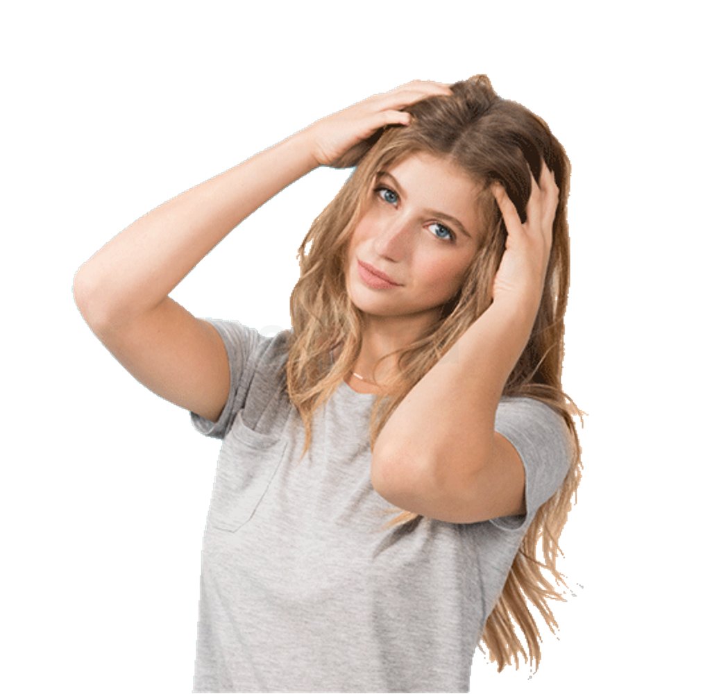 Woman putting hands in hair.