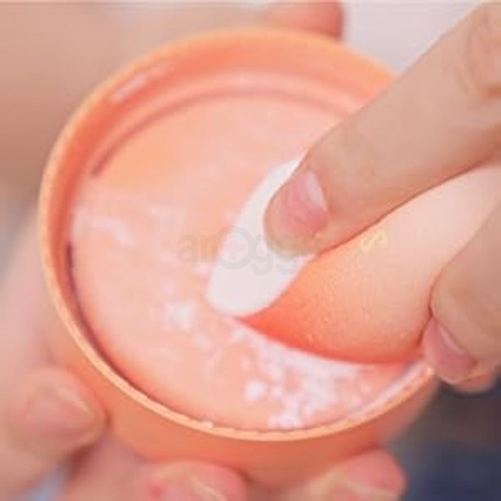Dab Makeup Sponge Into Powder